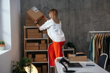 Fototapeta Tulipany - Organizing packages in an office setting