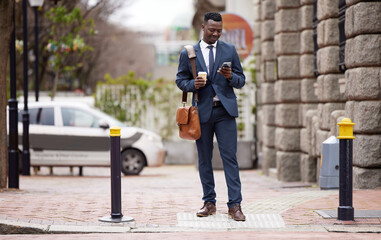 Canvas Print - Cell phone, walk and black man in city for work commute, social media and networking in town. Travel, professional and male worked in road with coffee, smartphone and internet for texting and email