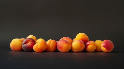 Wall Mural - Close-up view of colorful apricots captured in the studio