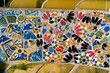 Detail of a colorful mosaic on a bench in Güell Park, Barcelona, Spain, Europe.