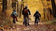© hamad - Family cycling trips in autumn, walks along paths in the forest, Hiking, collective active recreation. Children spend time with their parents.