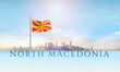 north macedonia national flag waving in beautiful building skyline.