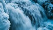 Ice and water mix at Arafed Waterfall in serene blue hues