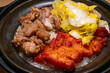 angle view Orleans-style Chicken Cutlet and Black Bean Spare Rib Claypot Rice at horizontal composition
