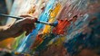 Artistic Creativity and Inspiration: An artist painting a colorful abstract artwork on a canvas, expressing creativity and artistic expression.