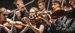 Symphonic orchestra performing classical music concert live on stage with professional musicians