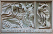MILAN, ITALY - SEPTEMBER 16, 2024: The relief of Martyrdom of St. Sebastian on the bronze gate of Cathedral - Duomo by Arrigo Minerbi (1937 - 1948)