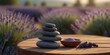 Spa advertisements, wellness retreat promotions, relaxation-themed designs,Spa Still Life: Lavender Field Background with Stones and Lavenders on Wooden Desk