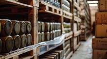 A Retail Warehouse With Shelves Filled With Cans And Boxes Made Of Wood And Metal For Mass Production And Storage, Resembling A Winery Barrel Room.