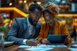 © Larisa AI - A focused couple immersed in data analysis on a digital tablet, dressed in smart casual attire in a modern workplace
