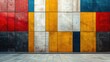 A vibrant and diverse array of colors on a geometric concrete wall giving an abstract, artistic feel to an urban environment