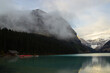 Wooden hut on Lake Louise on a fall day.