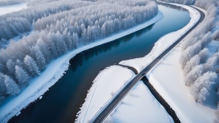 Wall Mural - Aerial top view of snow winter road with cars over blue river