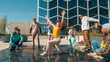 Energetic Young Adults Enjoy A Vibrant Dance Session Outdoors, Showcasing Diverse Styles Against A Modern Urban Background, Emphasizing Youth, Culture, And Friendship In A Lively, Communal Setting.