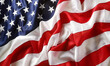 Close up of ruffled American flag. Cloth texture curved flag of USA.
