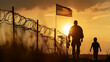 Silhouette of a soldier and a child at sunset with American flag and barbed wire fence.  Generative AI