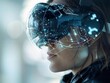 © JackBoiler - A woman is equipped with an advanced augmented reality headset displaying interactive data overlays and futuristic interfaces.