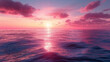 Sunset on the ocean. The evening pink sky is reflected on the sea surface.