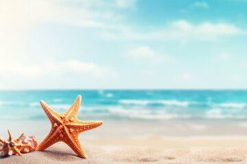 starfish on sandy beach by ocean, summer background, copy space