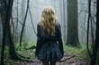 © Dipsky - A young woman with long blond hair wearing a gray dress stands alone in a dark and misty forest. The forest is filled with tall grass and bare trees