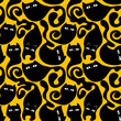 Seamless pattern with cute black Kittens. Creative black cats texture. Great for fabric, textile Vector Illustration
