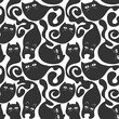 Black and grey Cats. Cartoon hand drawn seamless pattern. Vector EPS 10