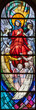 MILAN, ITALY - MARCH 6, 2024: The Assumption on the stained glass of the church Basilica di San Babila by from 20. cent.