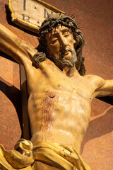 Sticker - MILAN, ITALY - MARCH 6, 2024: The detail of carved polychrome Crucifixion in the church Basilica di San Babila by unknown artist. 