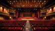 © Chingiz - An expansive auditorium theatre with rows of seats and a grand stage