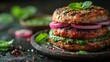   Close-up of a burger on a black surface Onion slices and herbs scatter the plate A lush green garnish of leafy herbs crowns the dish