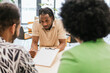 © ADDICTIVE STOCK - Focused Discussion at a Business Meeting