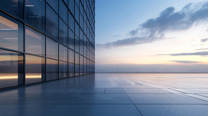 Poster - Contemporary skyscraper with glass facade against urban skyline at dusk