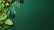Green summer background decorated with leaves and berries, copy space