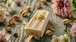 A white chocolate popsicle on a wooden surface with flowers and nuts around it. Popsicle with natural elements such as flowers on a rustic wooden surface.