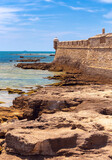 Fototapeta Boho - Old stone fort of San Sebastian and corner tower on a sunny day.