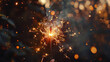 Sparkler burning on dark background, closeup photo with shallow depth of field