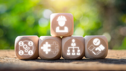 Wall Mural - Trade union concept, Wooden block on desk with labour, organization, cillaboration, delegation and legalization icon on virtual screen.