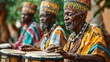 © Artyom - Elderly men playing traditional drums outdoors, focused and wearing colorful attire