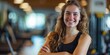 © KhaizanGraphic - Young adult beauty woman in gym. Standing confident with smile. Wellness concept