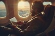 © AriyaniAI - businessman is using tablet and sitting in plane. traveling businessman concept