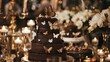 Exquisite chocolate birthday cake featuring handcrafted sugar butterflies and intricate lace detailing, showcased on a dessert table at a romantic candlelit wedding reception
