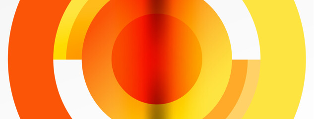 Poster - A closeup shot showcasing the vibrant colorfulness of a yellow and orange circle on a white background, displaying intricate patterns and symmetrical details, resembling an automotive wheel system