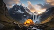 Hiking tent and backpack In mountains in morning with rays of sun with a mountain river and a waterfall. Travel, trekking tour to wild, exotic places, tourism, outdoor activities.