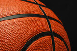 Fototapeta  - Close Up of Basketball on Black Background