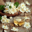 Essential oil of jasmine flower on wooden backgrounds