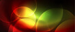A vibrant image featuring a blurry red, yellow, and green circle on a black background, creating a colorful and artistic pattern with hints of amber and lens flare