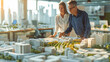 © Dina Photo Stories - Young Man and woman discussing new city layout model in Bureau of Architecture. business complex scale model on table. real estate developer architect and businessman working on new project in office