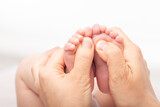 Fototapeta Perspektywa 3d - Infant feet massage