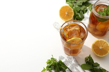 Wall Mural - Cold tea with fresh oranges and mint leaves