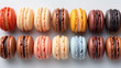 A Vibrant Array of Macarons Presents a Rainbow of Colors, Arranged Neatly in a Row